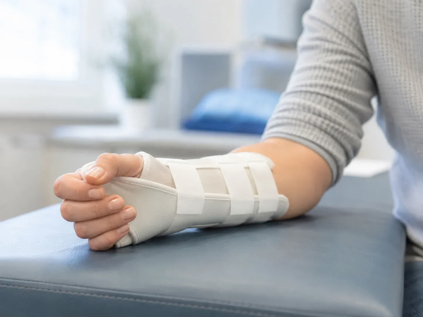 Patient wearing a clean wrist splint after a hand or wrist fracture