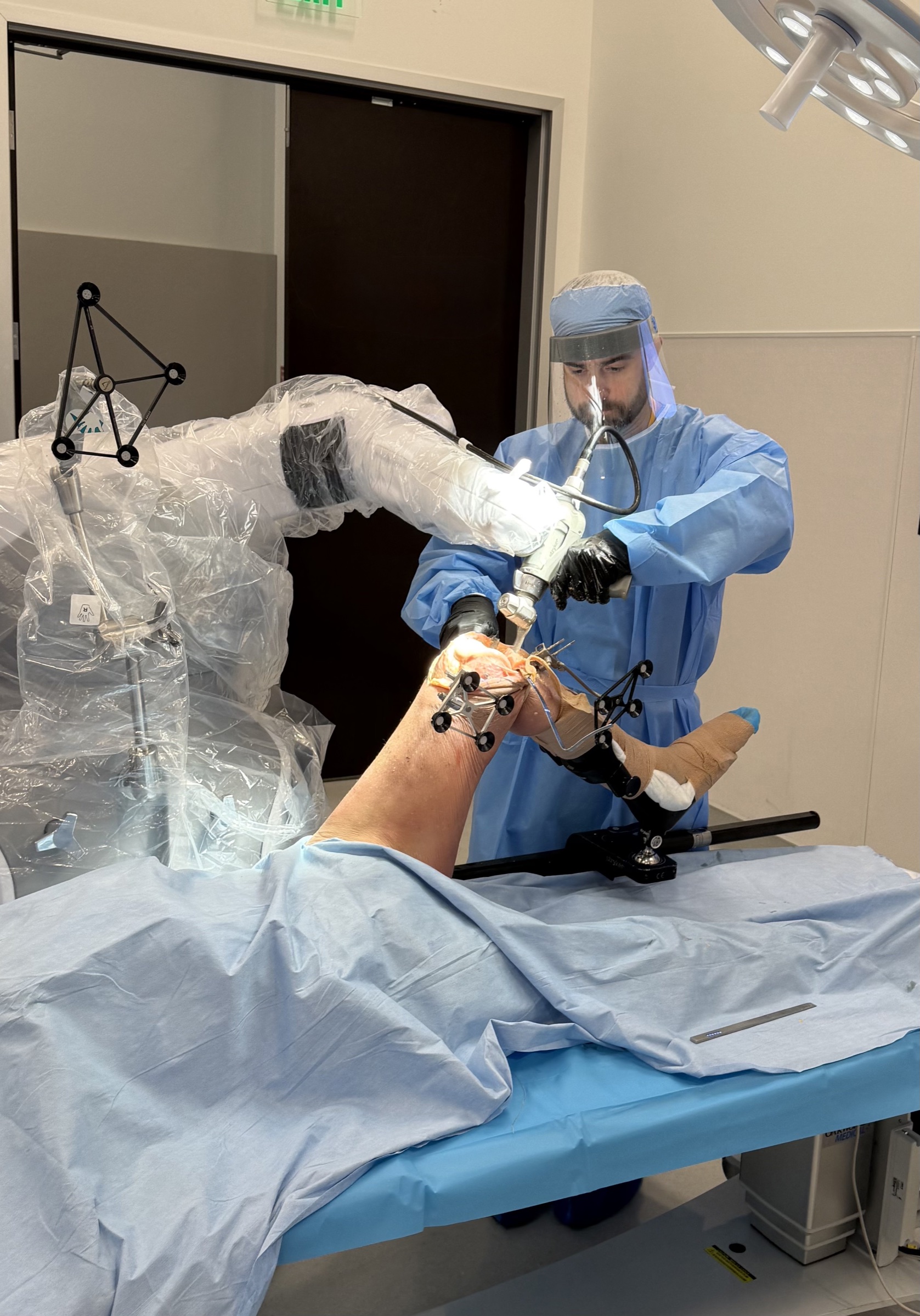 Dr. Barnes using the Mako robotic system during total knee replacement