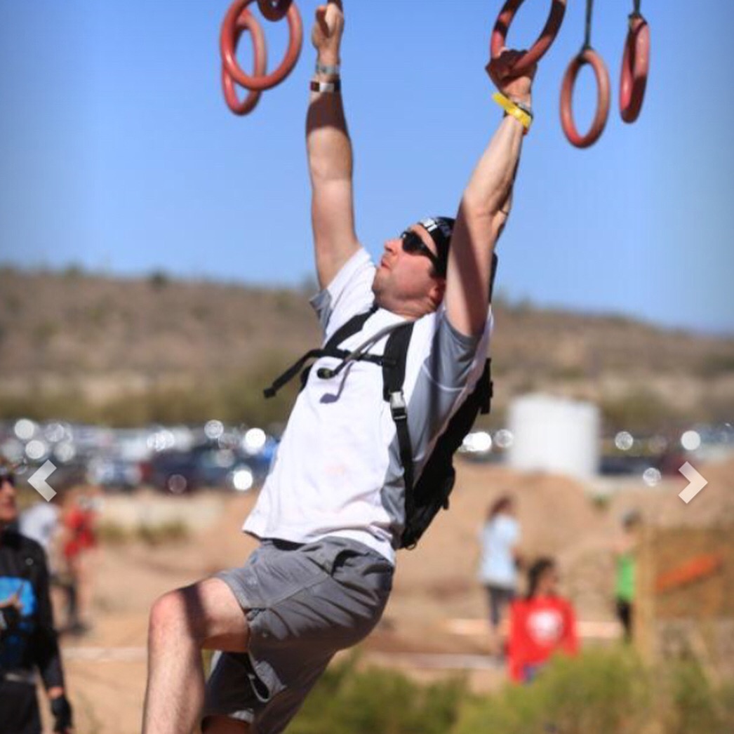 Dr. Barnes competing in an obstacle course race