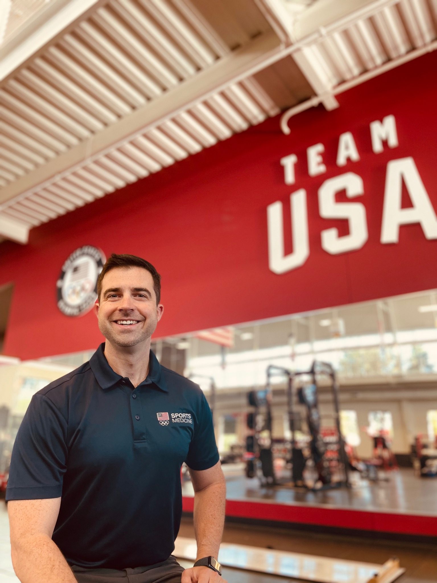 Dr. Barnes in Team USA Sports Medicine polo at the Team USA training facility
